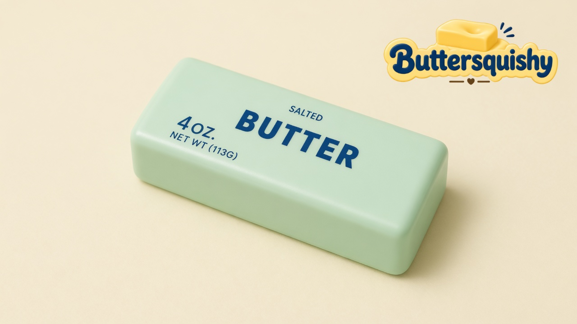 One pale mint-green salted-butter loaf with navy 4 OZ. and BUTTER type on a light-yellow cream studio surface, Buttersquishy logo in the upper right