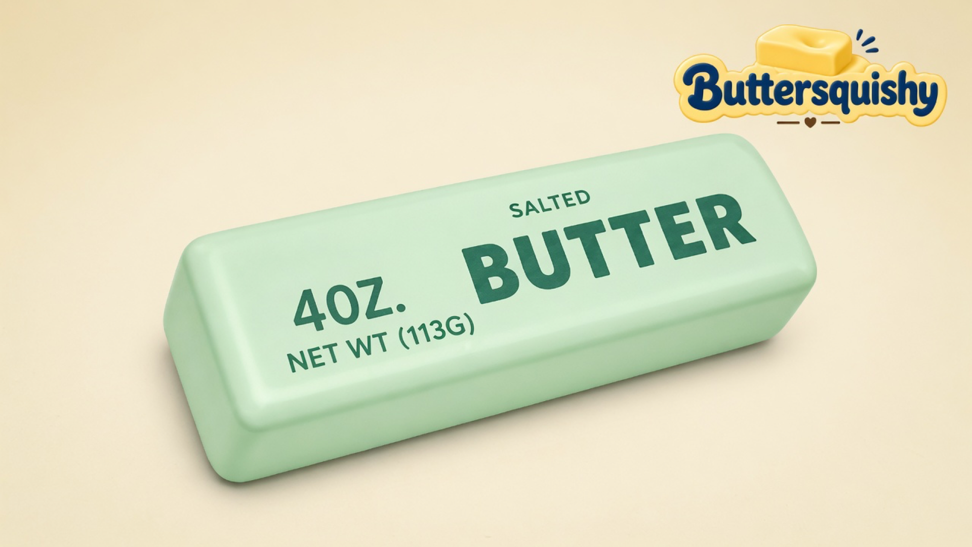 A single pale-mint Mint Butter Stick with forest-green SALTED BUTTER type on a light-yellow cream studio, Buttersquishy logo at upper right