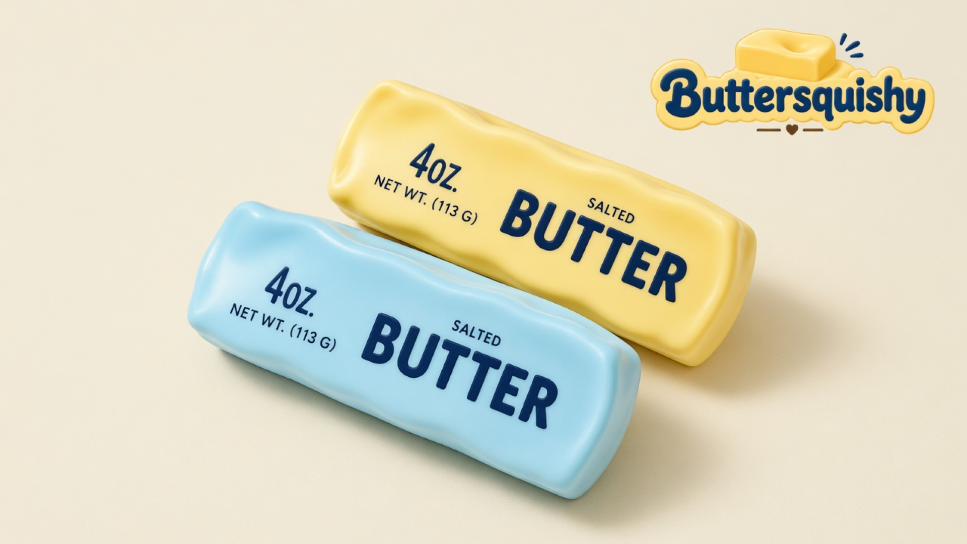 Lemon-yellow and ice-blue food-style butter sticks with navy SALTED BUTTER type on a light-yellow cream studio surface, Buttersquishy logo in the upper right