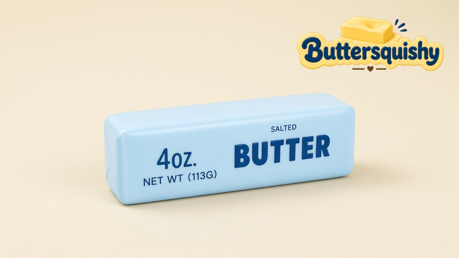 One pale baby-blue Blue Butter Stick with navy 4OZ and SALTED BUTTER type on a light-yellow cream studio table, Buttersquishy logo in the upper right