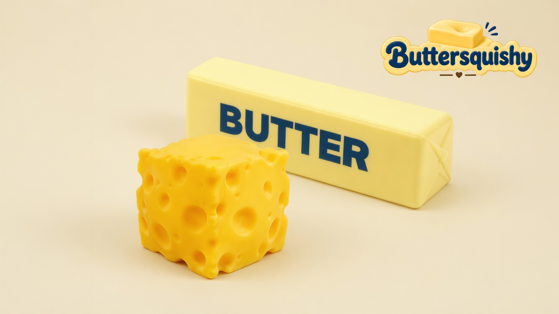 A holey cheddar-yellow cheese cube and a pale butter stick printed navy BUTTER on a light-yellow cream studio surface, Buttersquishy logo in the upper right