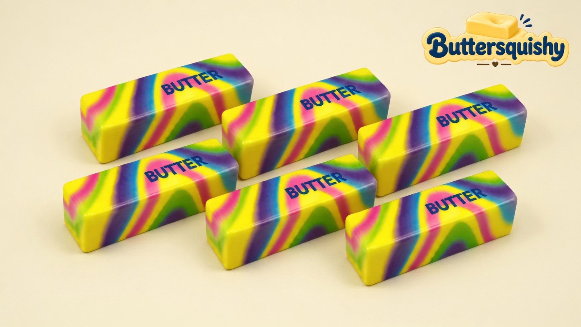 Six neon-swirl butter loaves printed navy BUTTER on a light-yellow cream studio surface, Buttersquishy logo in the upper right