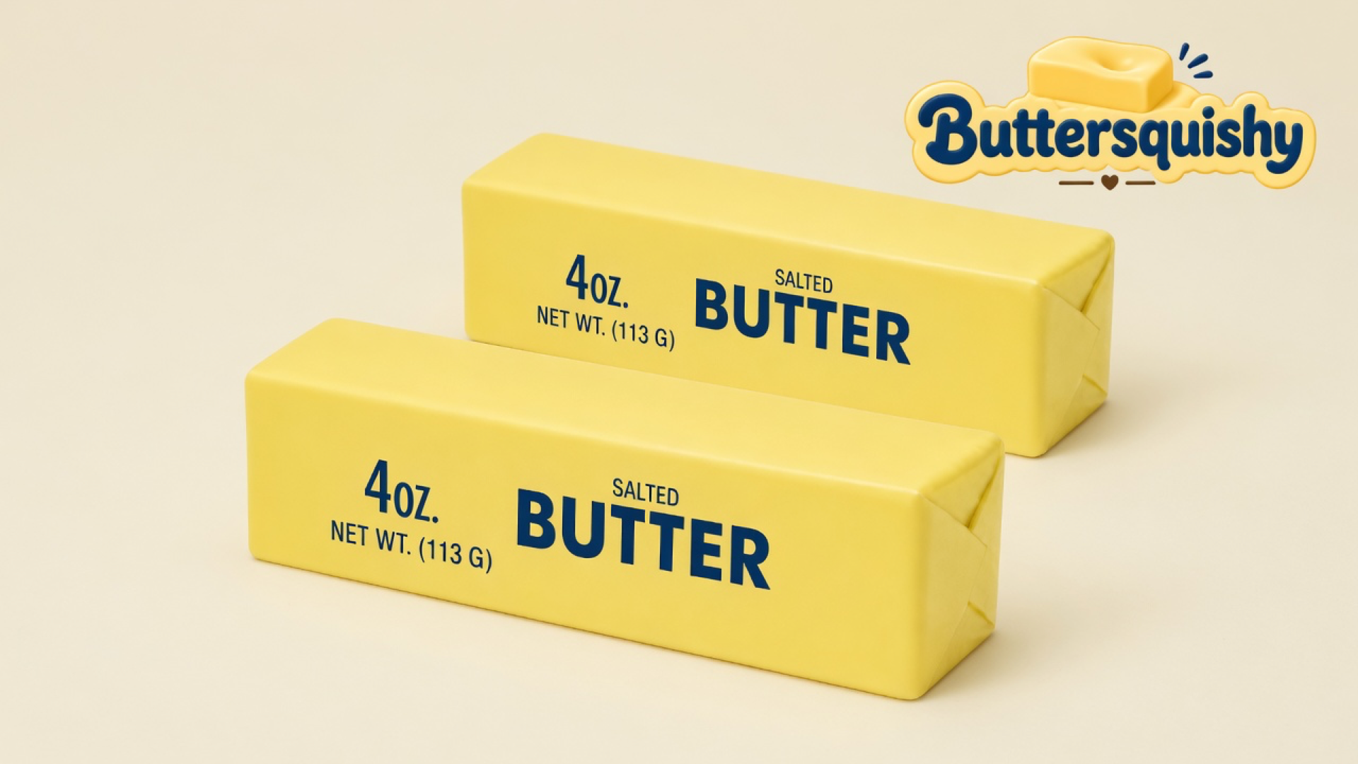 Two pale yellow Classic Gift butter sticks with navy SALTED BUTTER print on a light-yellow cream studio surface, Buttersquishy logo at upper right