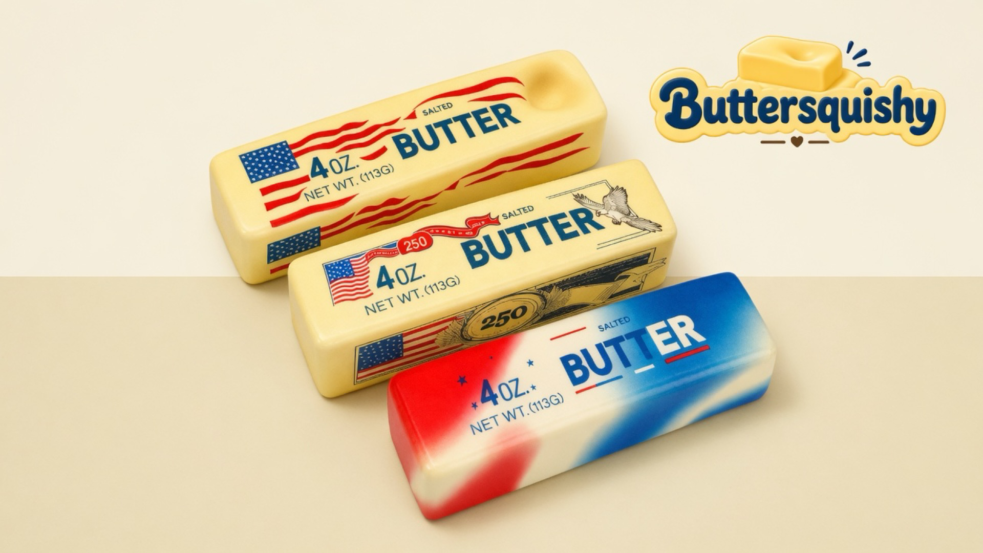 Three Stars and Stripes Butter sticks — wave-flag, eagle-250, and red-cream-blue marble — on a light-yellow cream studio surface, Buttersquishy logo in the upper right