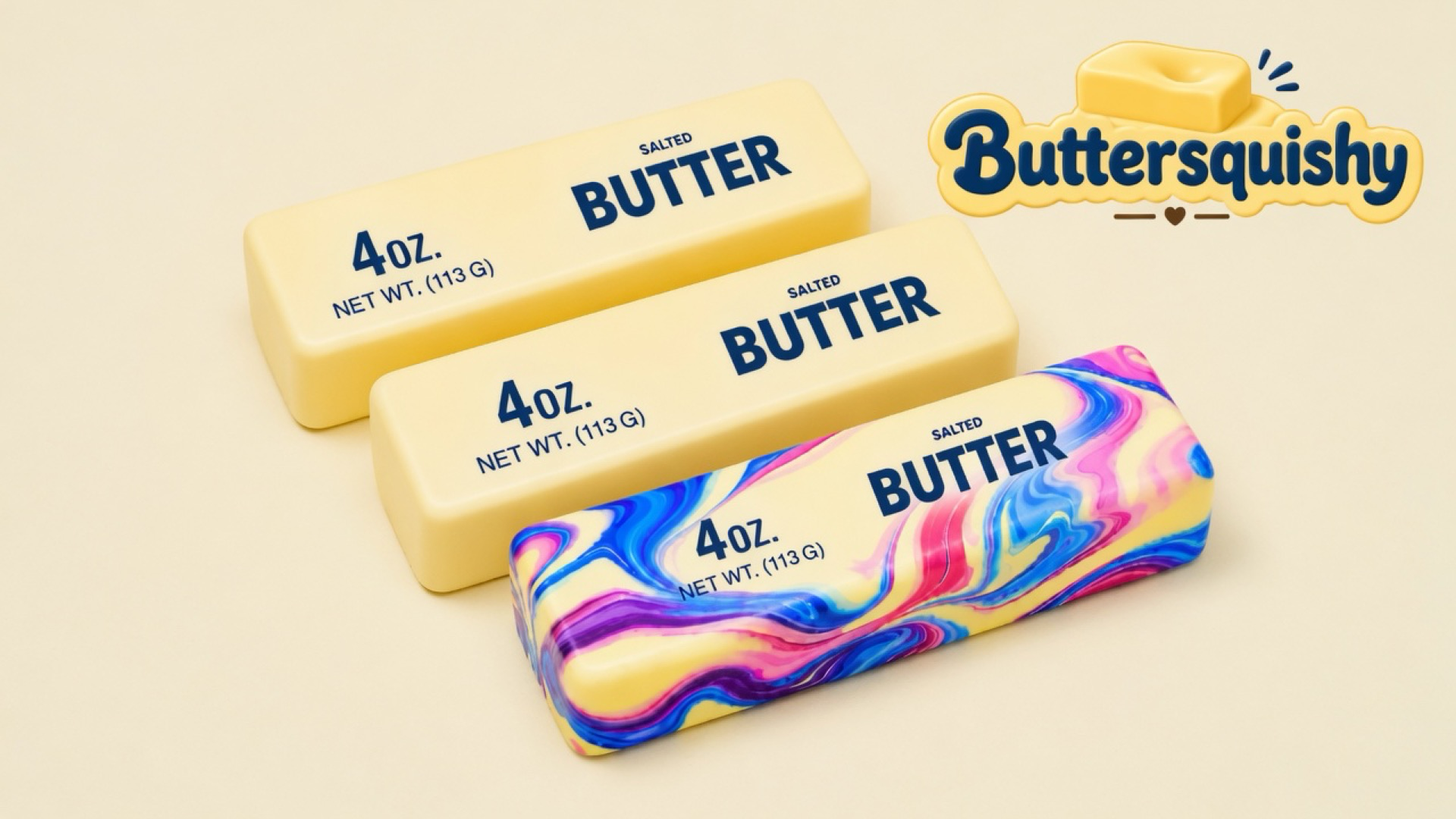 Two pale yellow SALTED BUTTER sticks and one pink-blue-purple marble swirl loaf on a light-yellow cream studio surface, Buttersquishy logo in the upper right