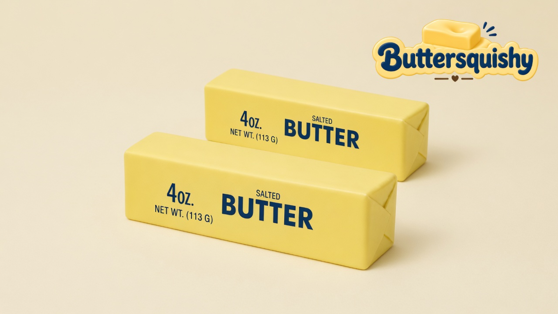 Two pale yellow salted-butter stick squishies on a light-yellow cream studio surface, Buttersquishy logo in the upper right