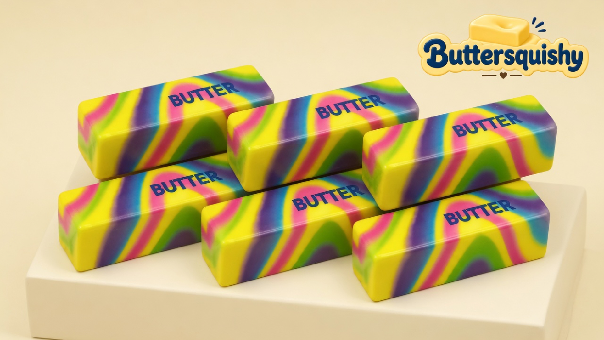 Six neon-yellow swirl butter-stick squishies printed BUTTER on a light-yellow cream studio block, Buttersquishy logo in the upper right