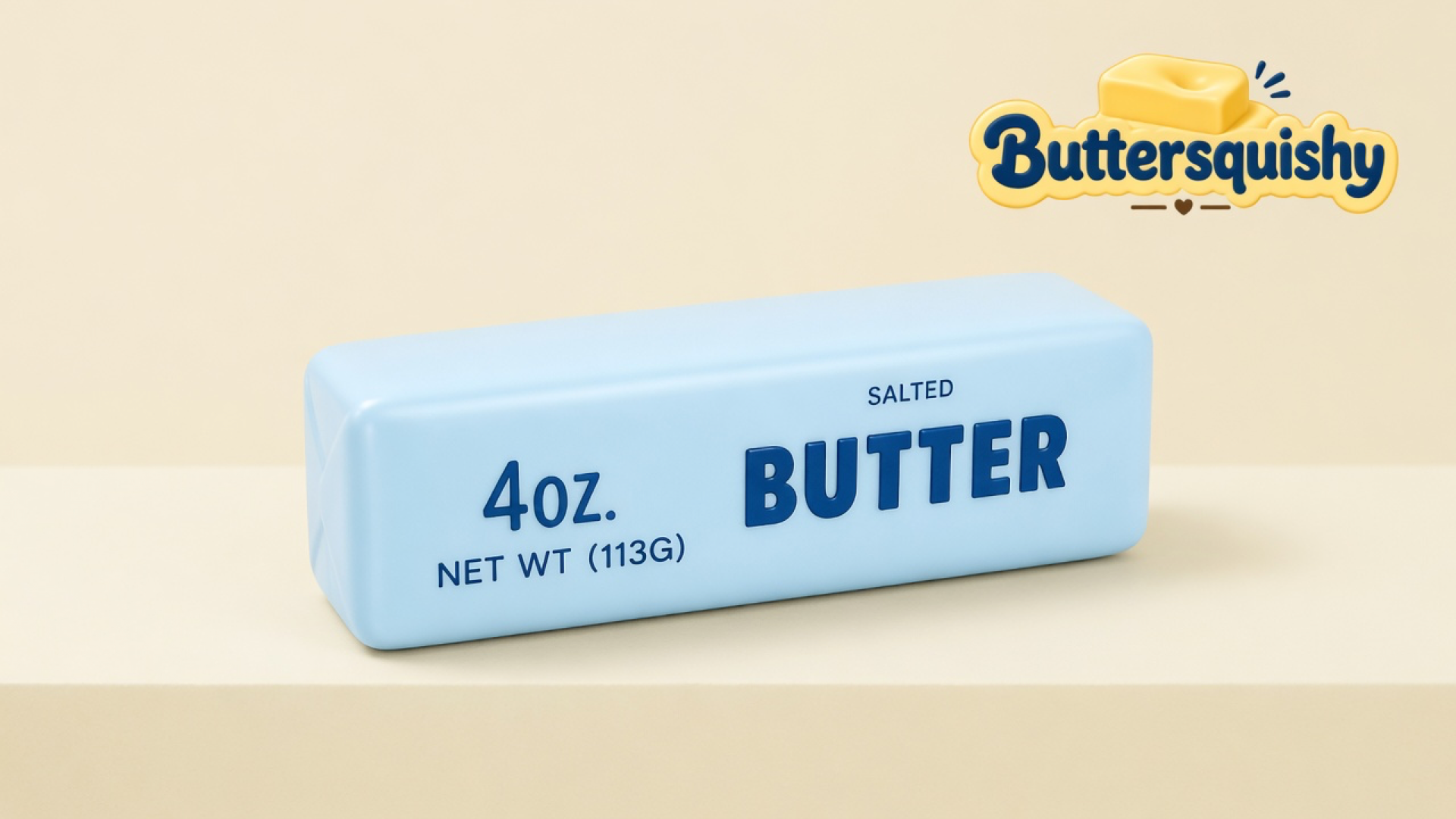 Pale-blue salted-butter stick with navy 4OZ and BUTTER type on a light-yellow cream studio, Buttersquishy logo at upper right