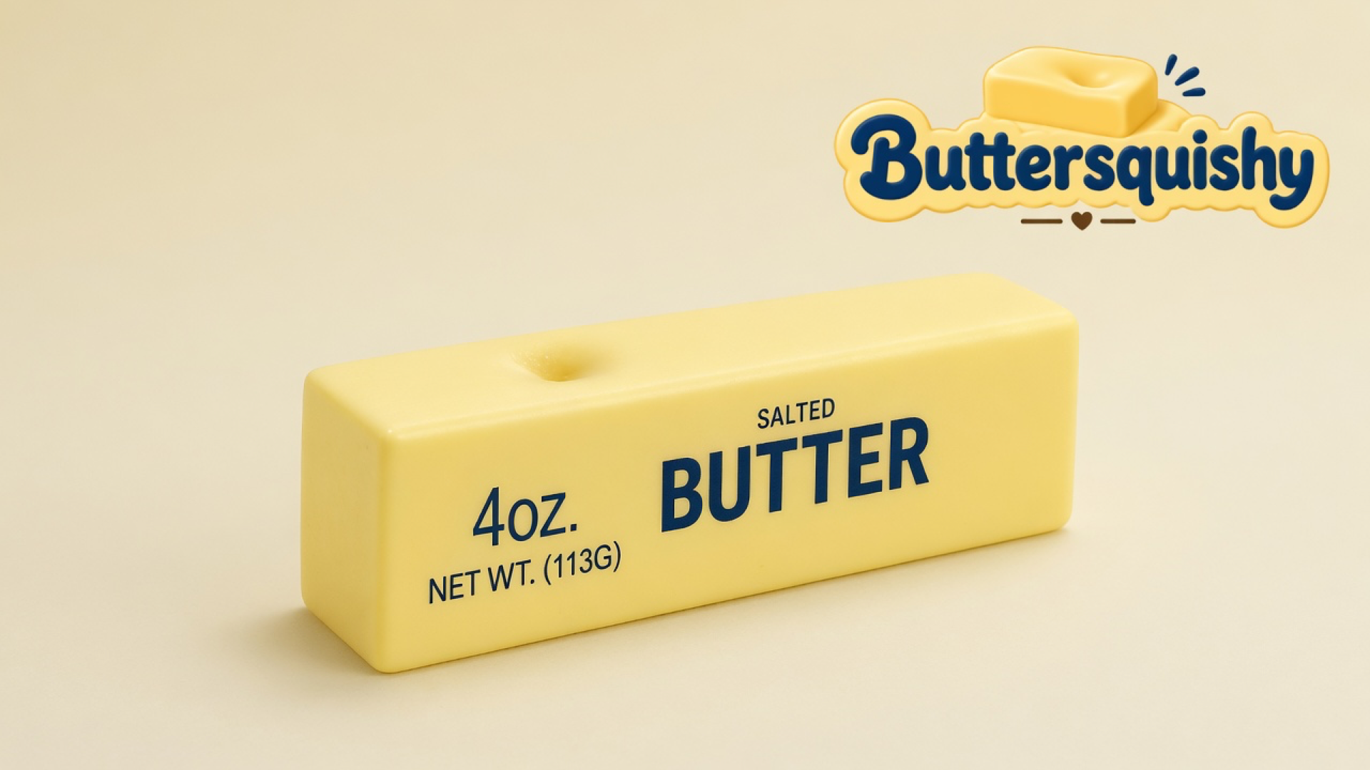 Pale yellow Classic Gift Butter stick on a light-yellow cream studio, Buttersquishy logo at upper right