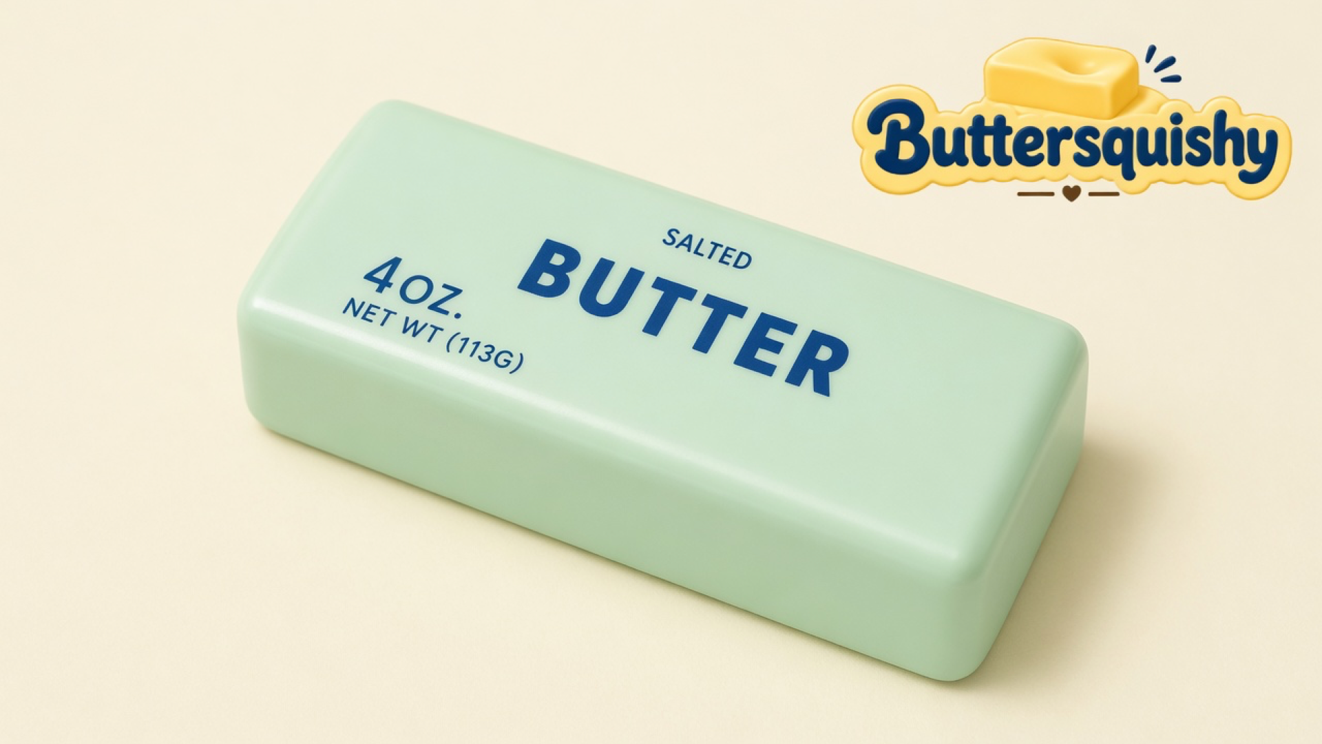 One pale mint-green Mint Lemon Crunch Butter loaf printed SALTED BUTTER on a light-yellow cream studio surface, Buttersquishy logo in the upper right