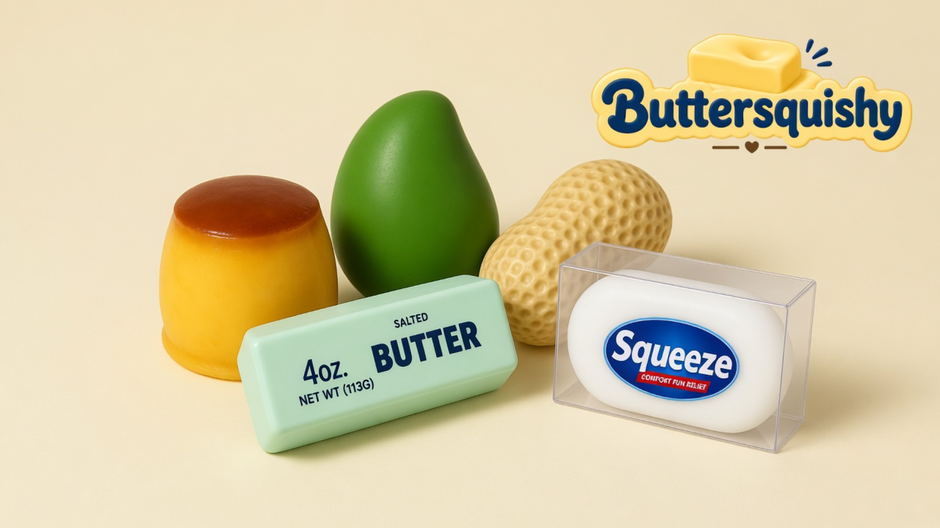Five Mixed Butter Pack toys — caramel-top custard cup, green mango, ridged peanut, mint salted-butter stick, and boxed Squeeze oval — on a light-yellow cream studio surface, Buttersquishy logo in the upper right