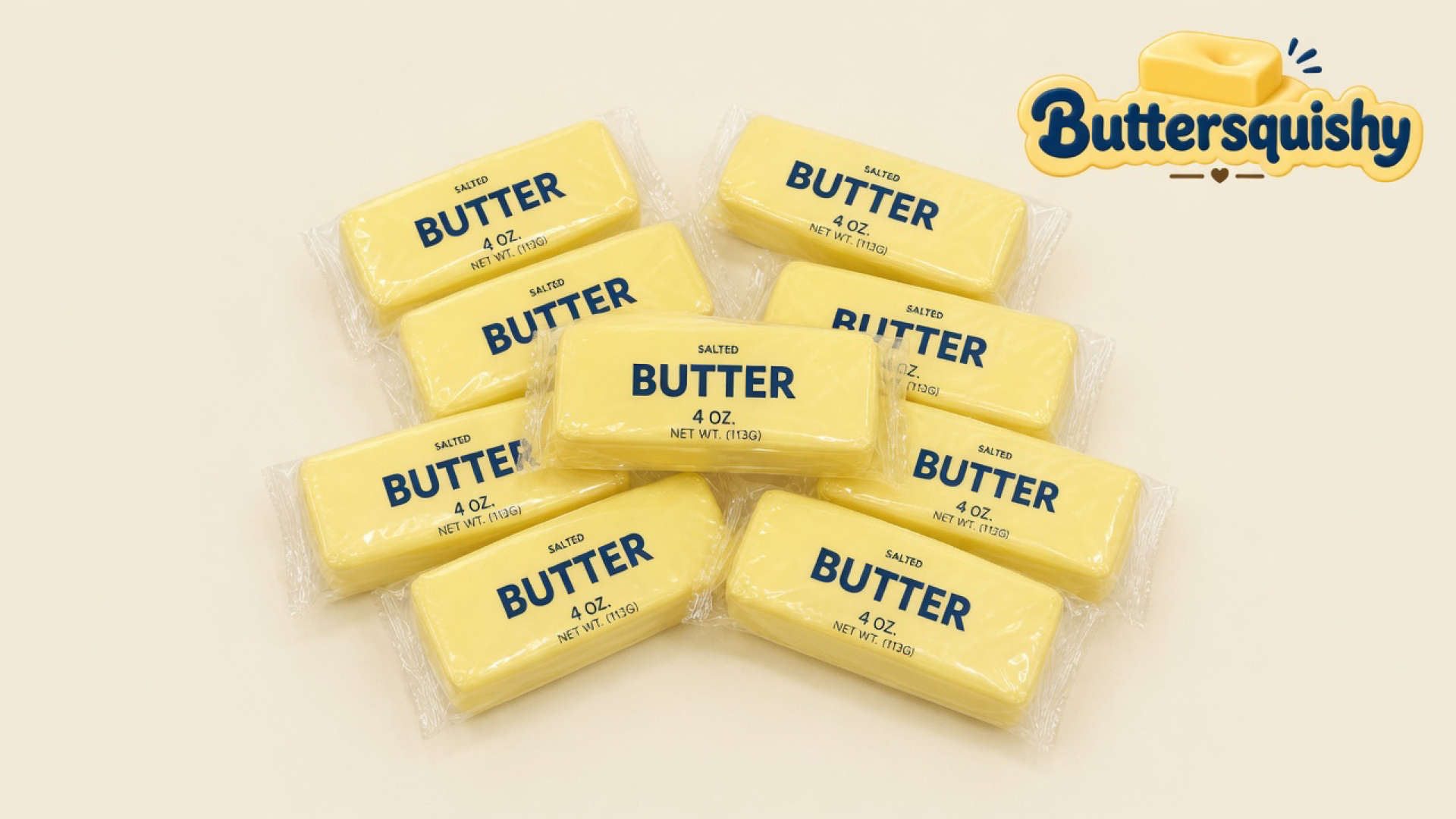 Twelve pale yellow SALTED BUTTER wrap sticks clustered on a light-yellow cream studio surface, Buttersquishy logo in the upper right