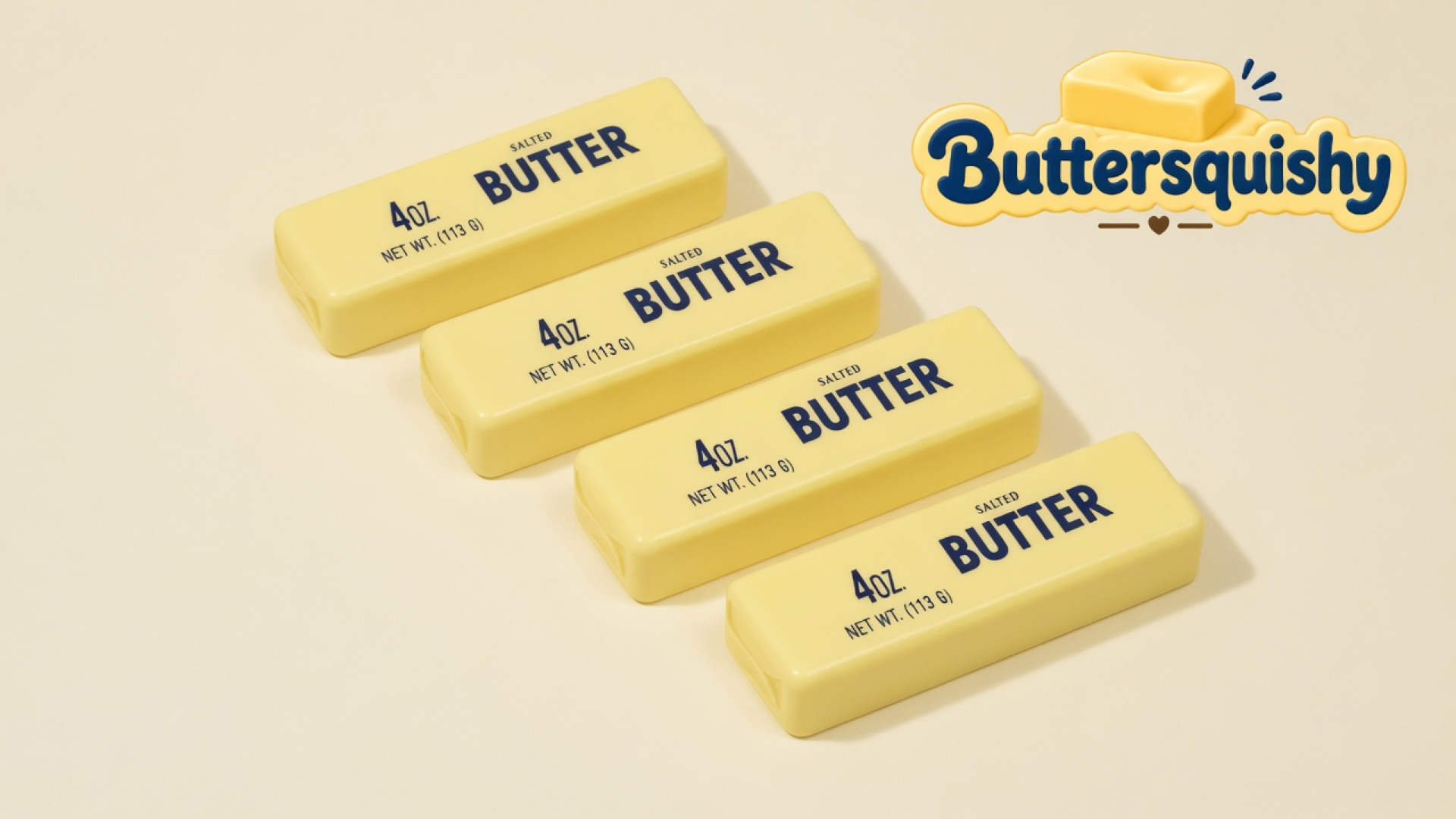 Four yellow Cheese Cube Loaf butter sticks with navy SALTED BUTTER print on a light-yellow cream studio surface, Buttersquishy logo in the upper right