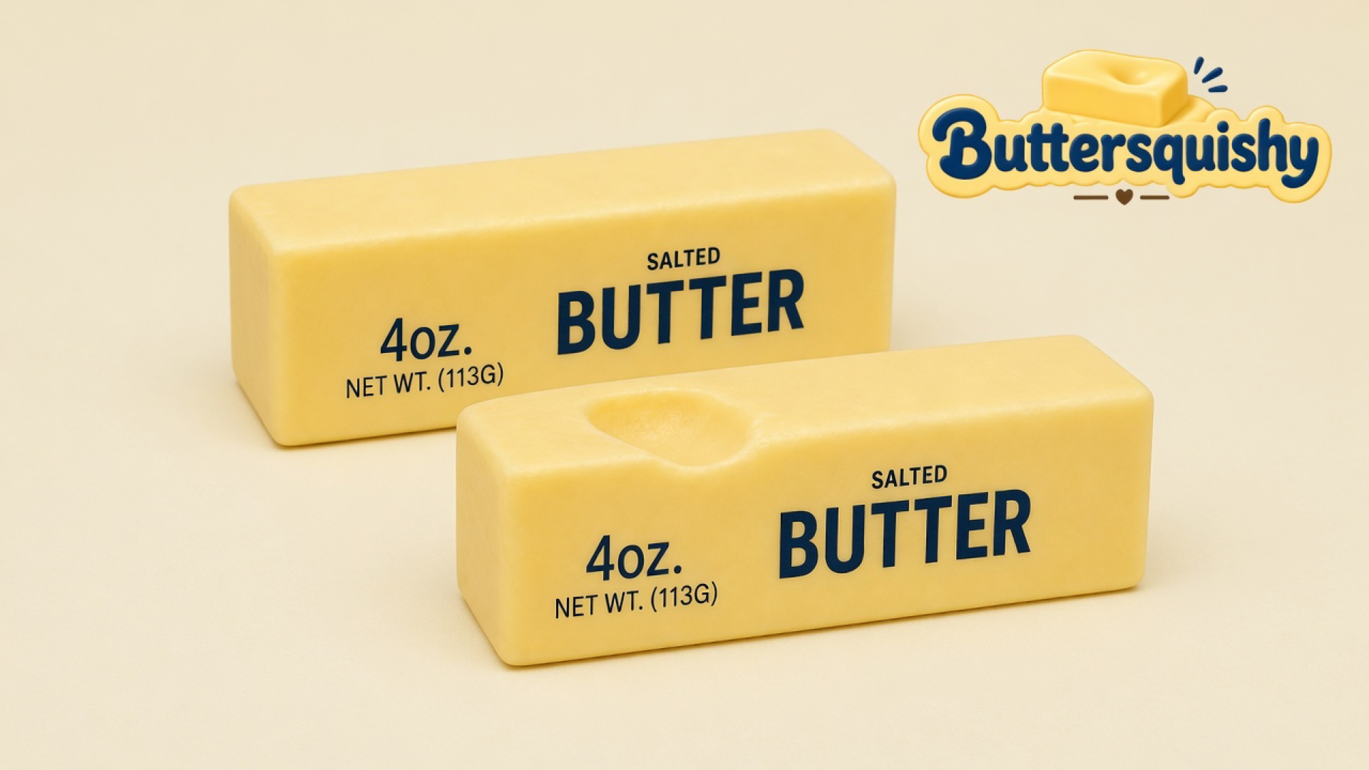 Two pale yellow SALTED BUTTER sticks on a light-yellow cream studio table, one with a thumb dent, Buttersquishy logo in the upper right