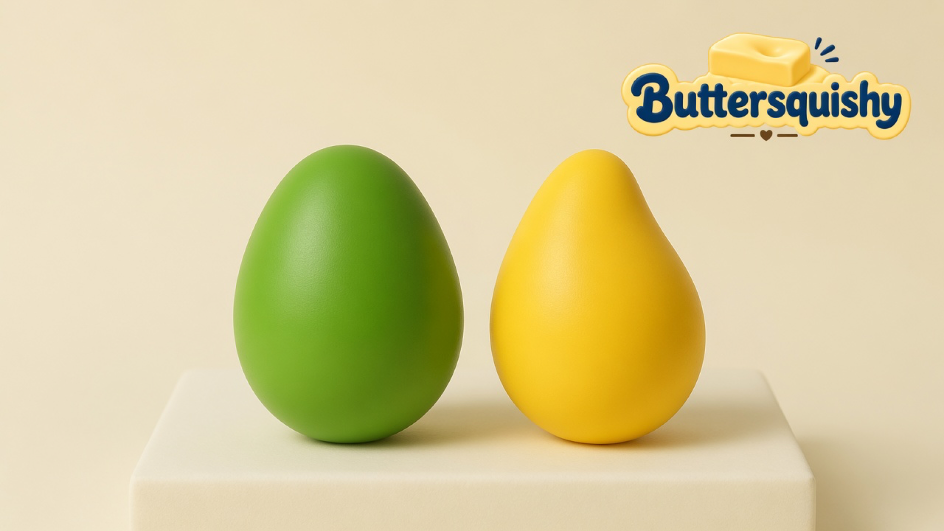 Leaf-green oval and mango-yellow teardrop Mixed Butter Pack toys on a cream studio block, Buttersquishy logo in the upper right