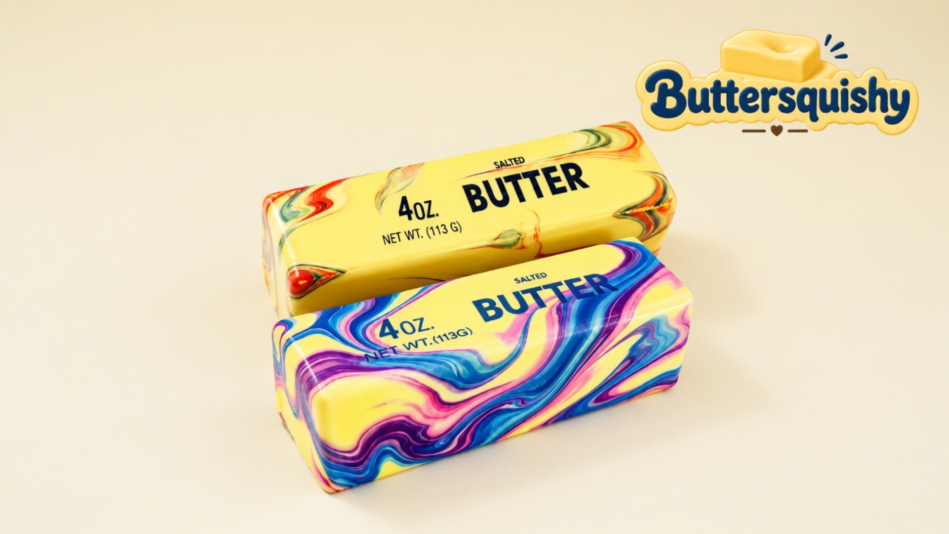 Warm-marble and cool-marble Blue Butter Stick 2-Pack loaves on a light-yellow cream studio surface, Buttersquishy logo in the upper right