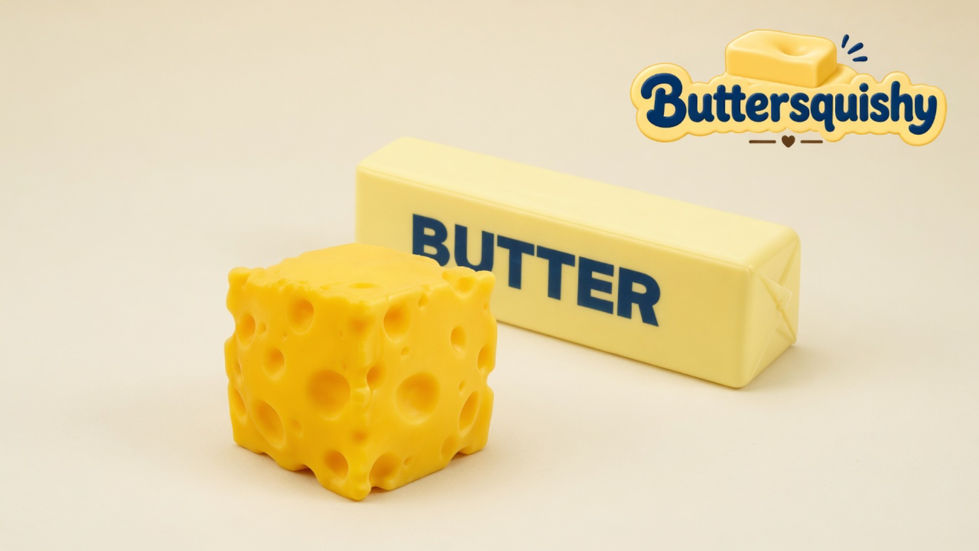 A lemon-yellow Swiss-hole cheese cube and a pale folded stick printed BUTTER on a light-yellow cream studio, Buttersquishy logo in the upper right