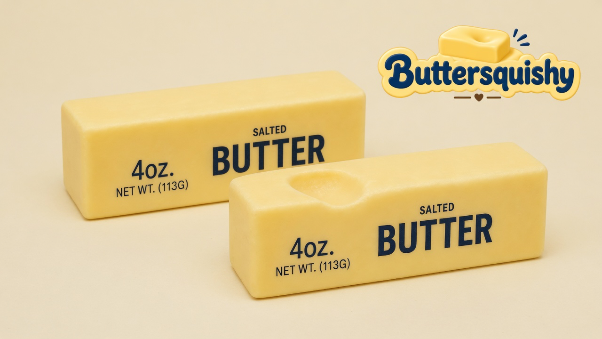 Two pale yellow Classic Gift Butter sticks printed SALTED BUTTER, one with a thumb dent, on a light-yellow cream studio sweep, Buttersquishy logo in the upper right