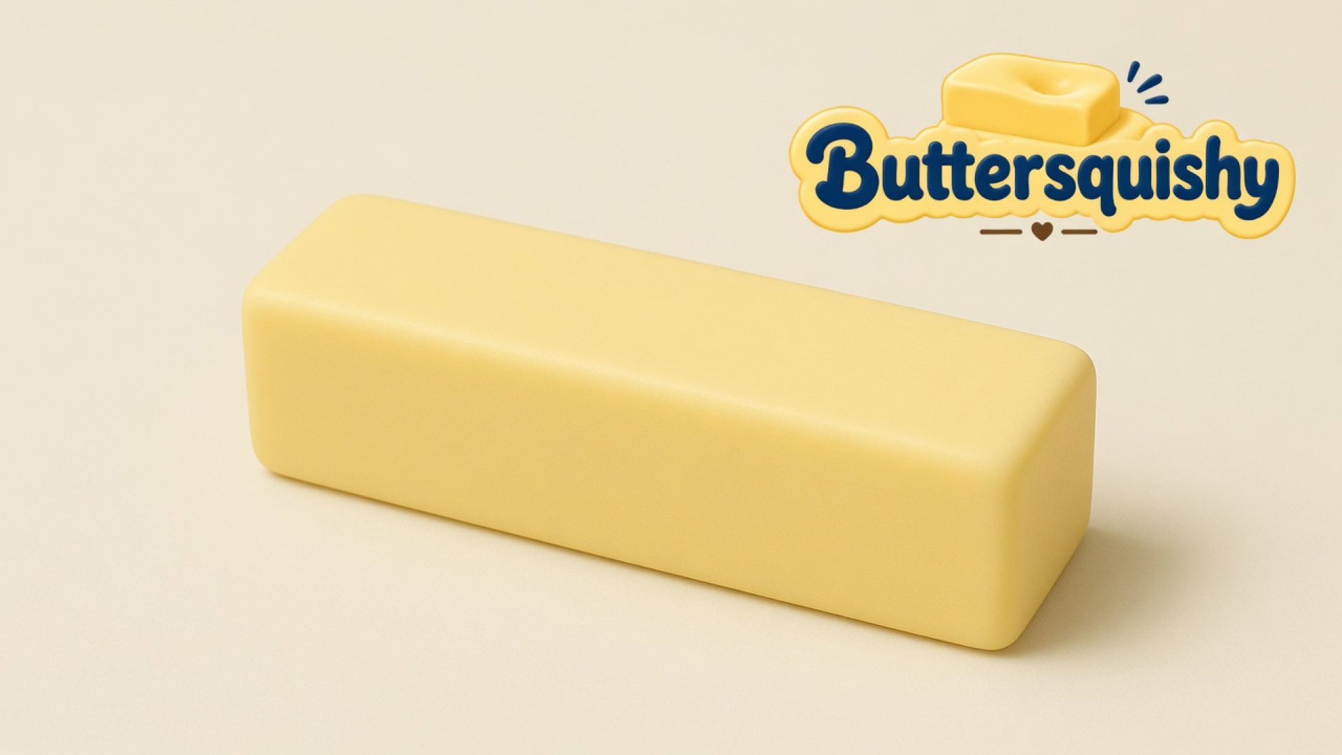One unprinted pale-yellow Classic Gift Butter stick on a light-yellow cream studio surface, Buttersquishy logo in the upper right