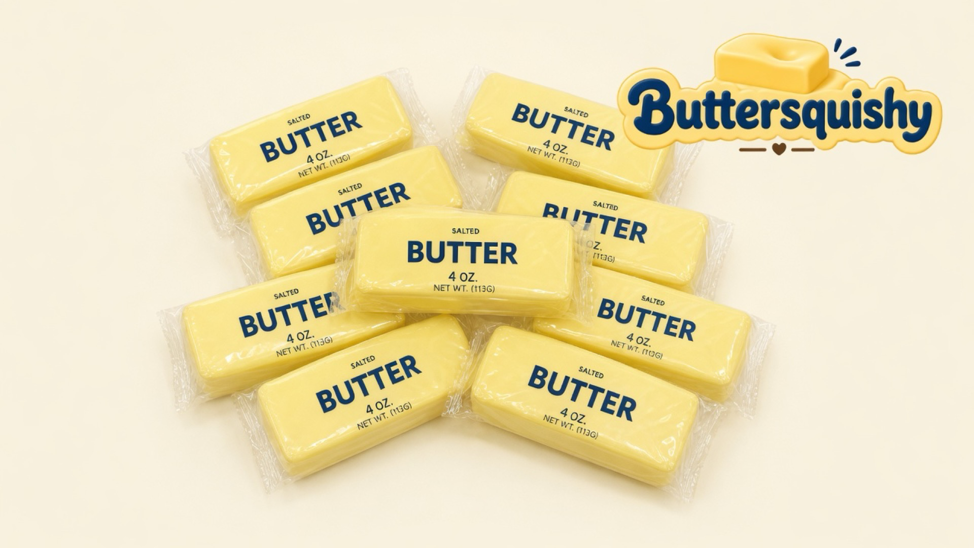 A cluster of pale-yellow SALTED BUTTER wrap sticks on a soft light-yellow cream studio surface, Buttersquishy logo in the upper right