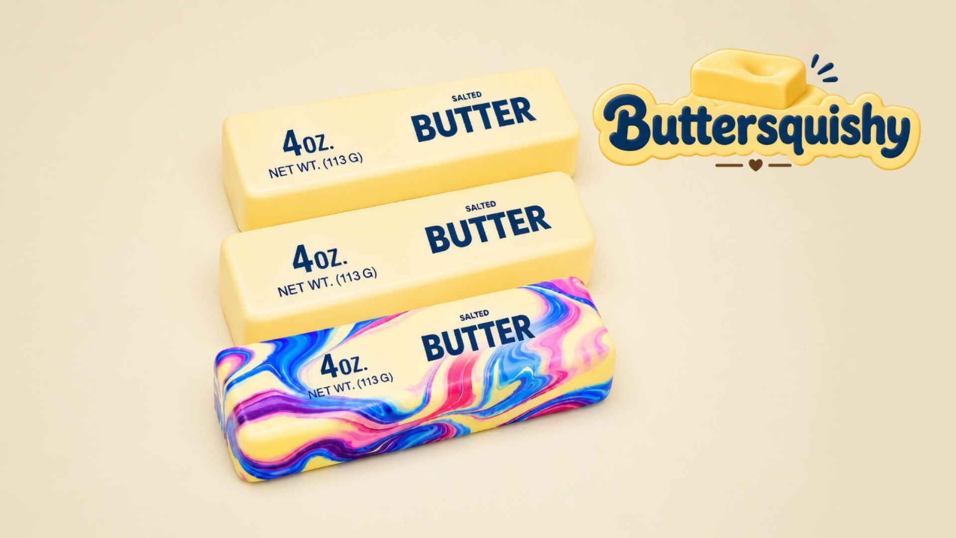 Two pale yellow SALTED BUTTER sticks and one blue-pink marble swirl loaf on a light-yellow cream studio surface, Buttersquishy logo in the upper right