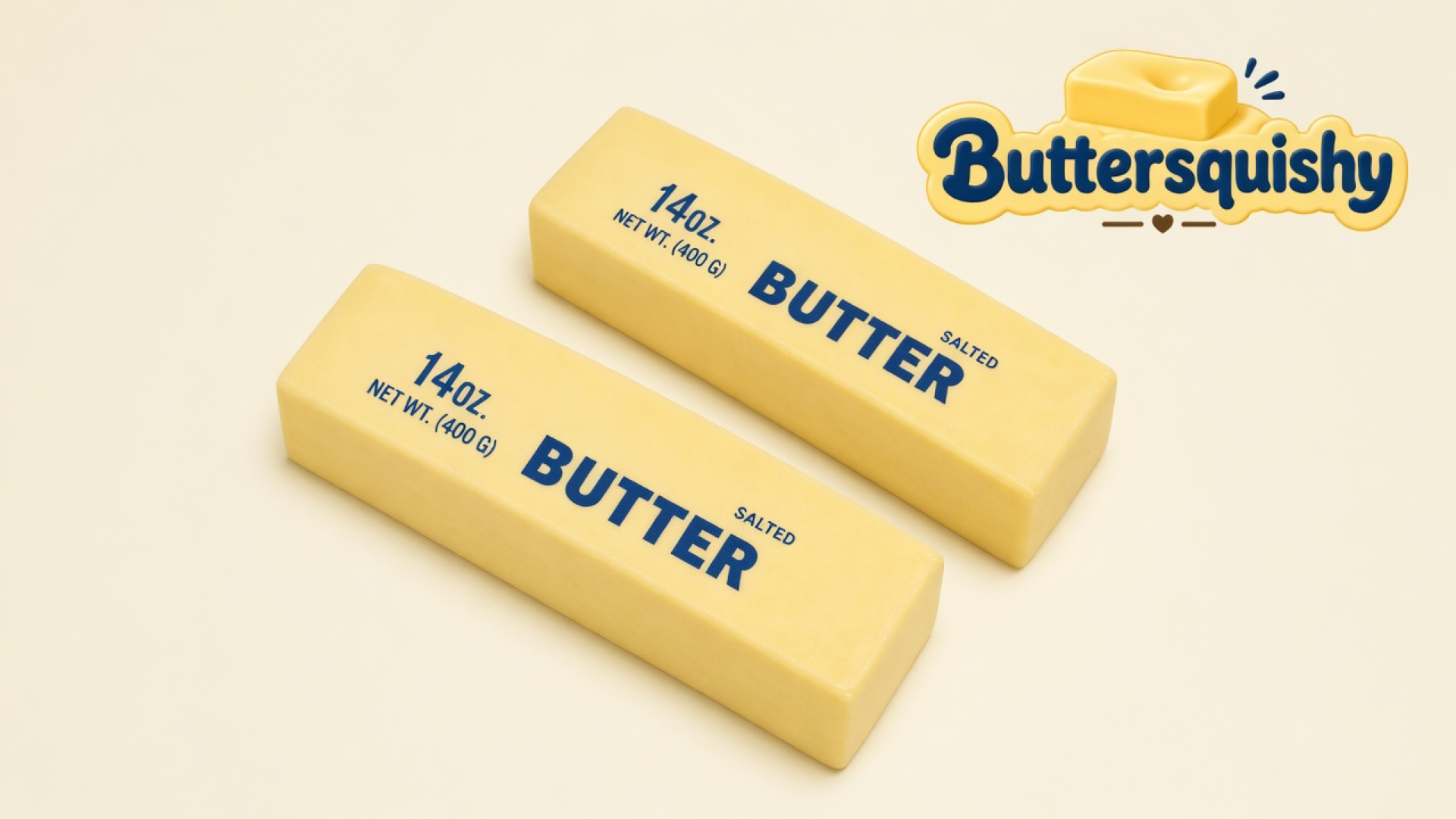 Two pale-yellow jumbo butter loaves printed 14oz NET WT (400 G) SALTED BUTTER on a light-yellow cream studio, Buttersquishy logo in the upper right