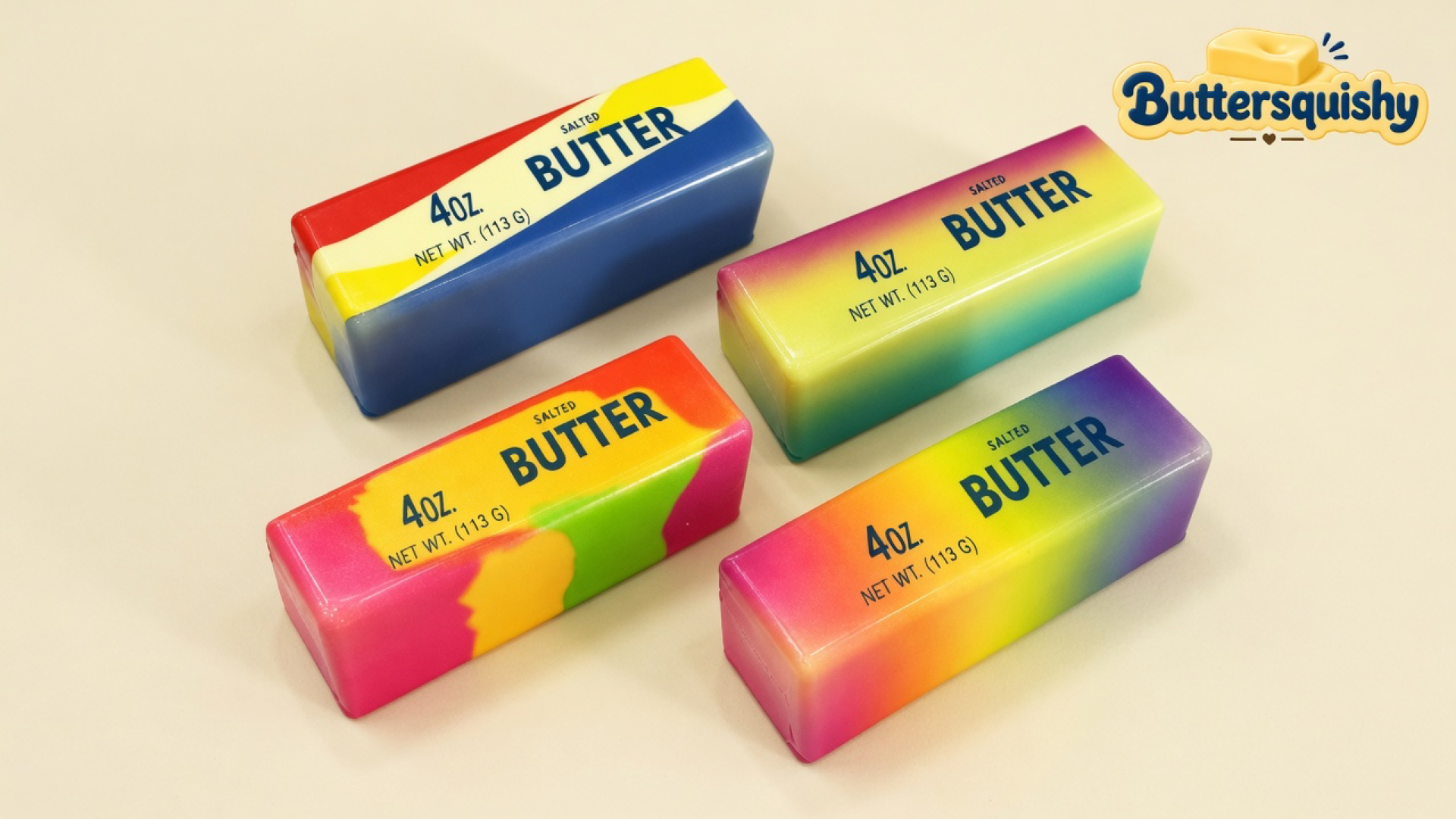 Four swirl-painted rectangular butter-stick toys with navy BUTTER type on a light-yellow cream studio, Buttersquishy logo in the upper right