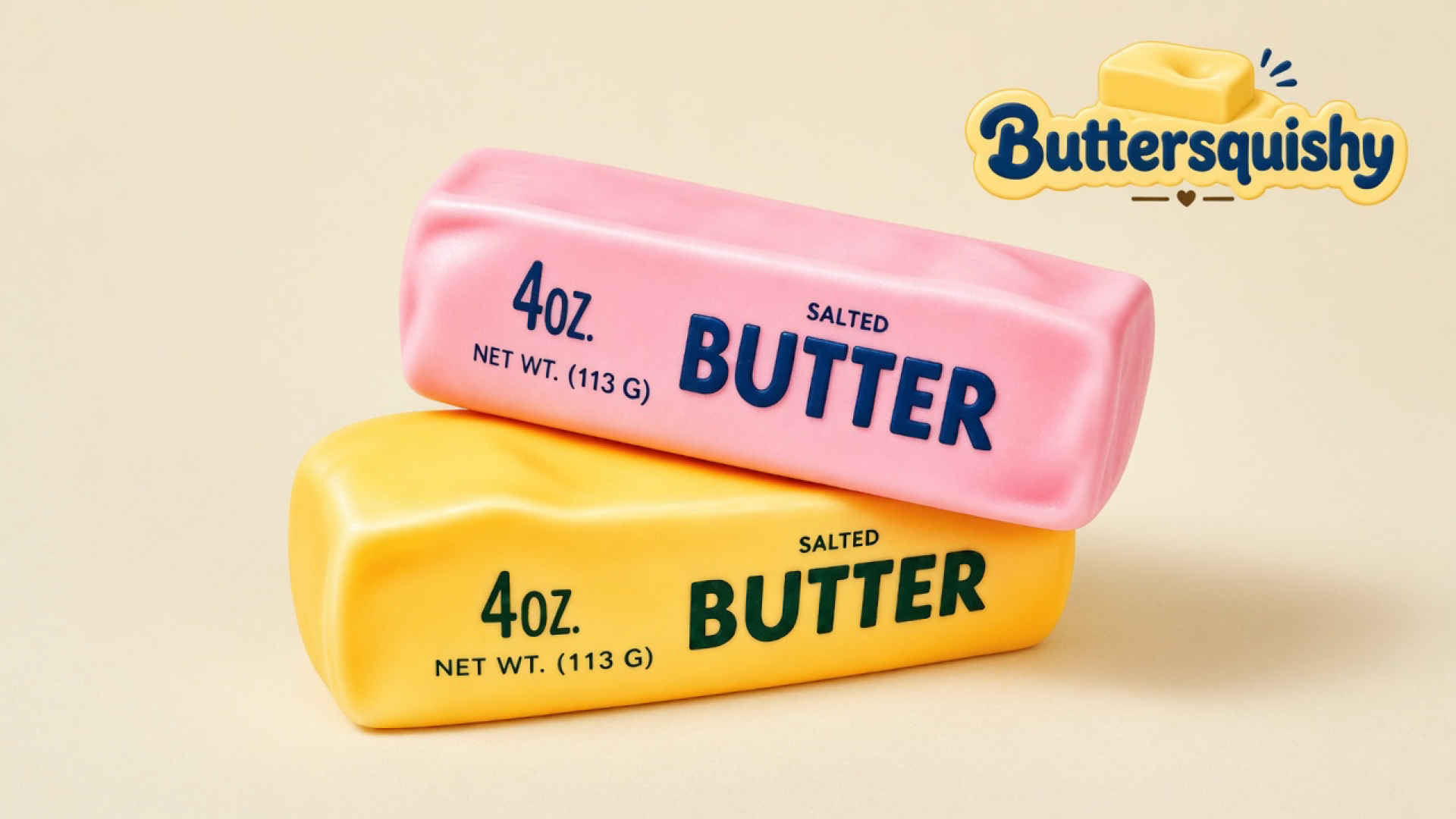 Pink and yellow-orange Pink Orange Crunch Butter sticks printed SALTED BUTTER, stacked on a light-yellow cream studio surface, Buttersquishy logo in the upper right