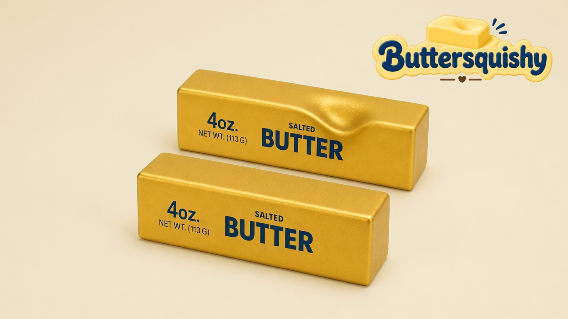 Two metallic gold butter-stick squishies printed 4oz. NET WT. (113 G) SALTED BUTTER on a light-yellow cream studio, one with a thumb dent, Buttersquishy logo once at the upper right