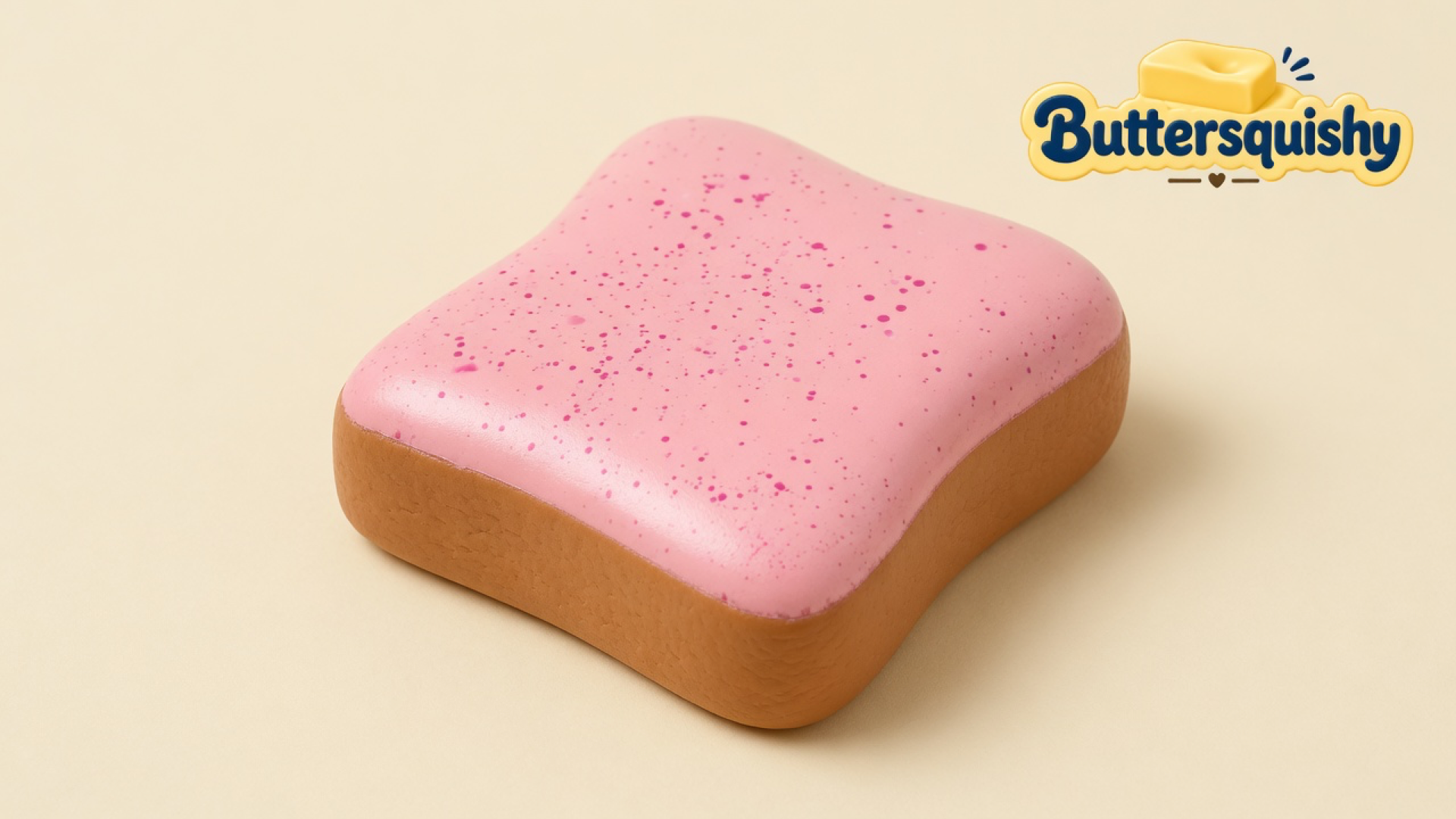 One pink toast-face Bread Toast Loaf with magenta speckles and a golden-brown crust on a light-yellow cream studio, Buttersquishy logo in the upper right
