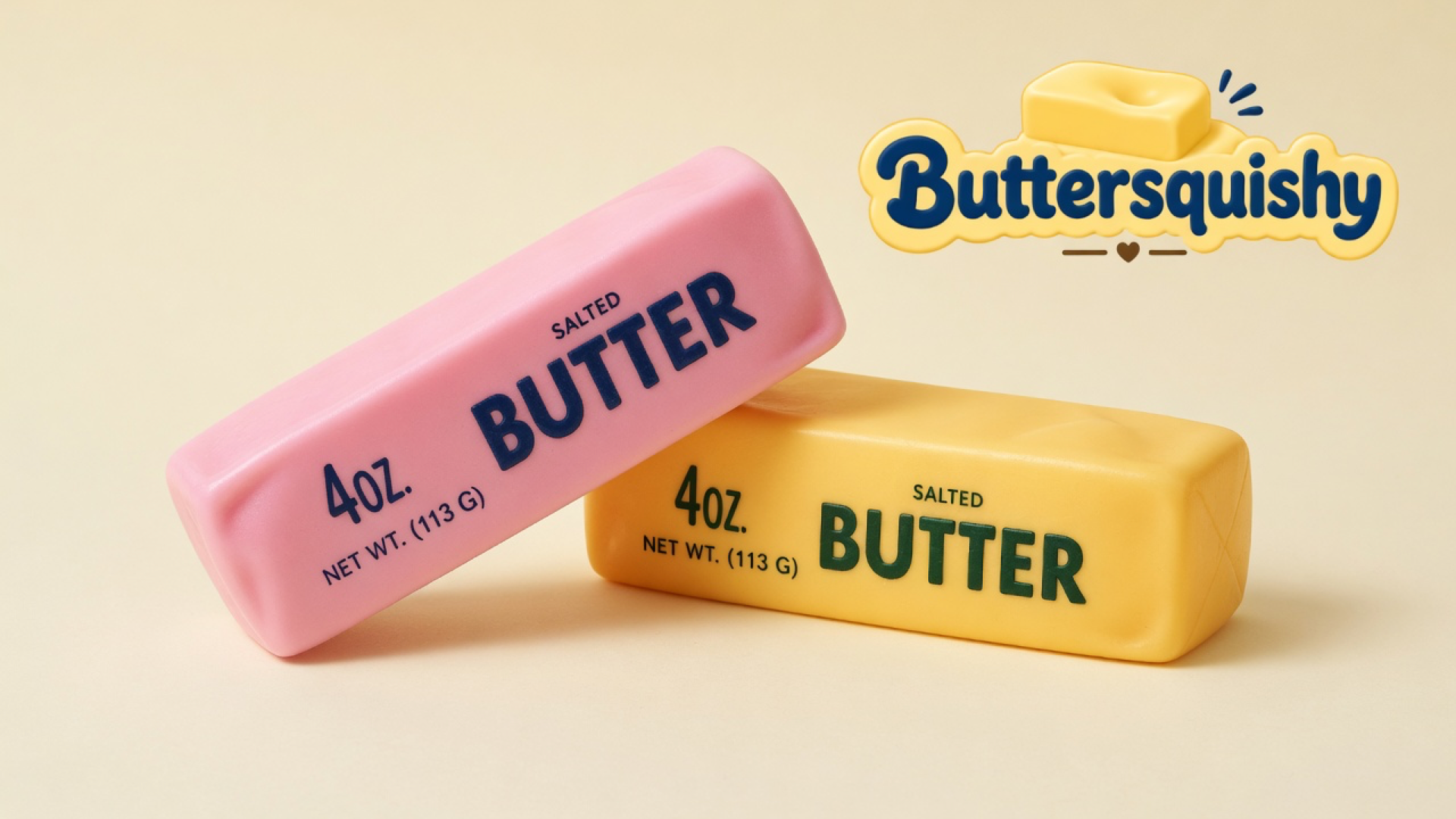 Candy-pink and yellow-orange Pink Orange Crunch Butter sticks printed SALTED BUTTER on a light-yellow cream studio surface, with the Buttersquishy logo in the upper right